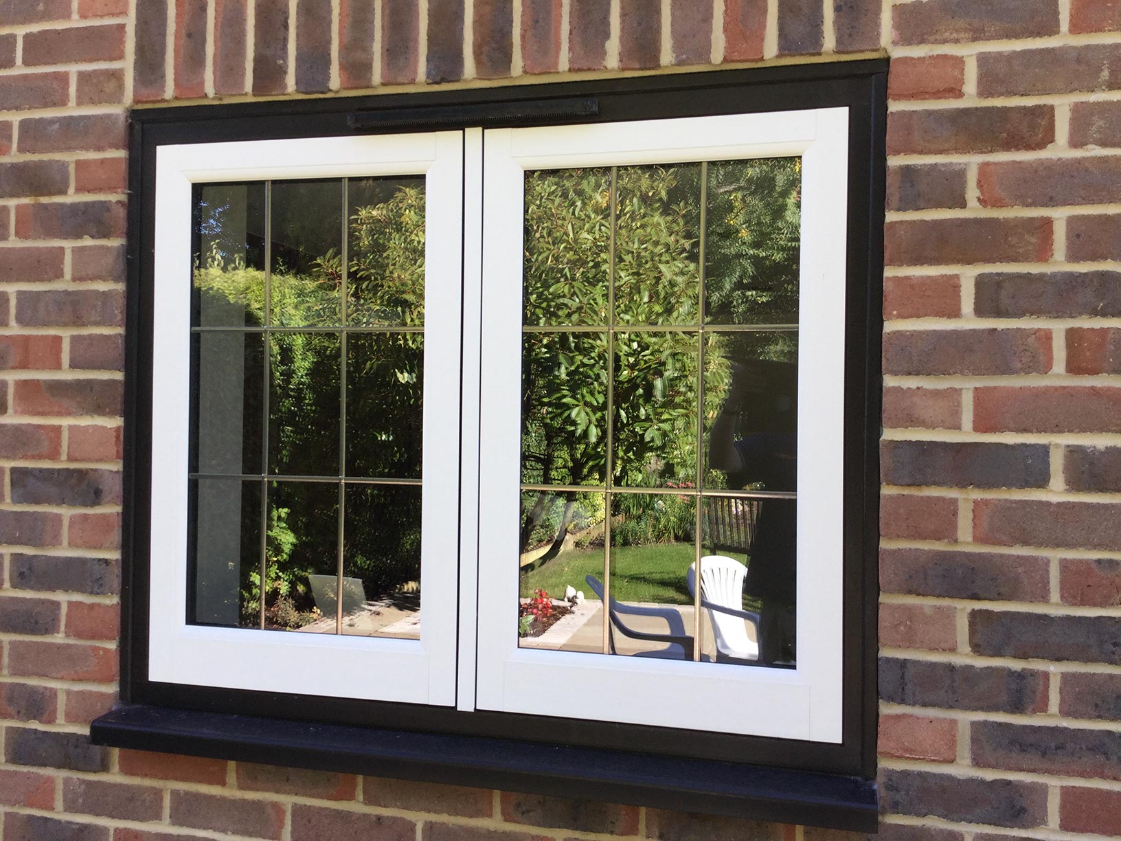 Dual colour flush sash double glazed windows in Charlwood, Surrey