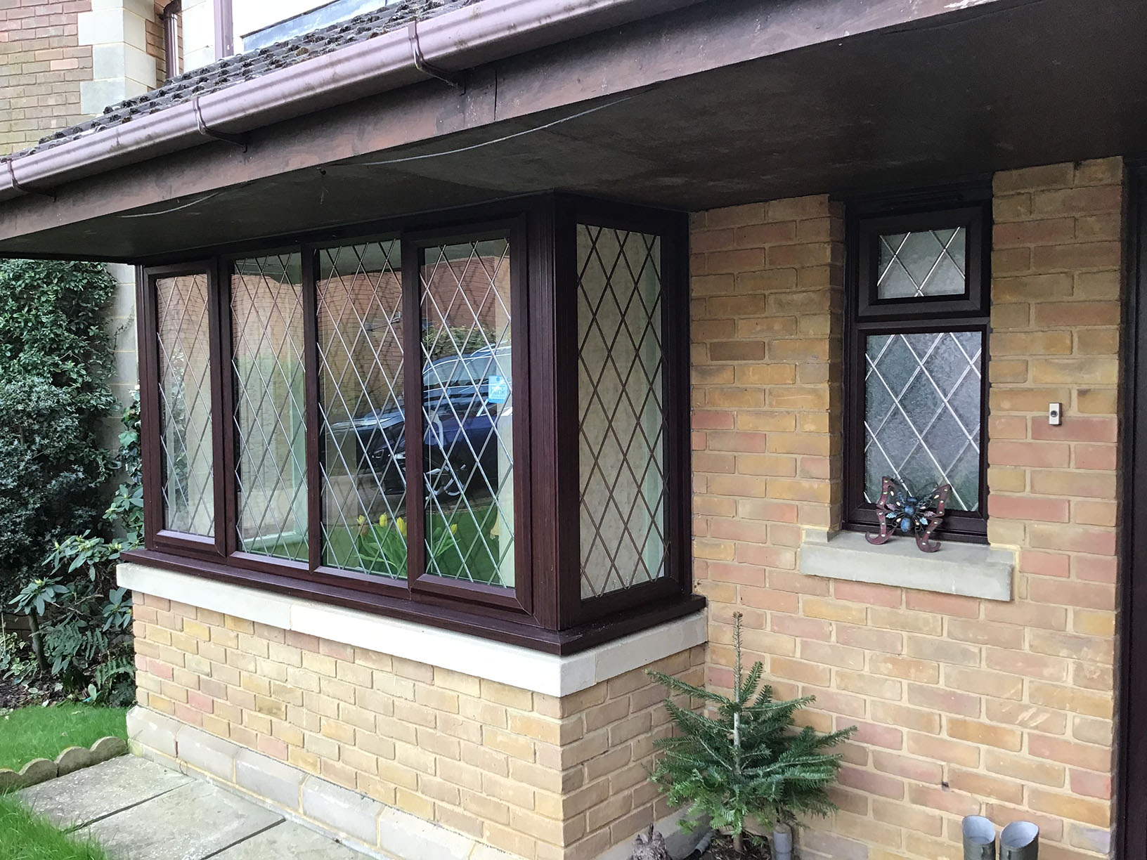 Black Double-Glazed Windows With Leaded Bars