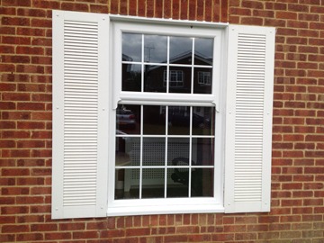 Double glazing sash windows with side shutters