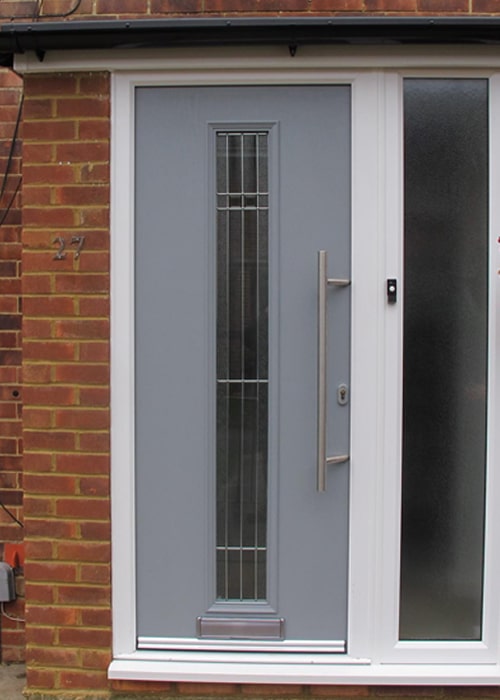 New porch with grey composite door installed in Horsham, West Sussex