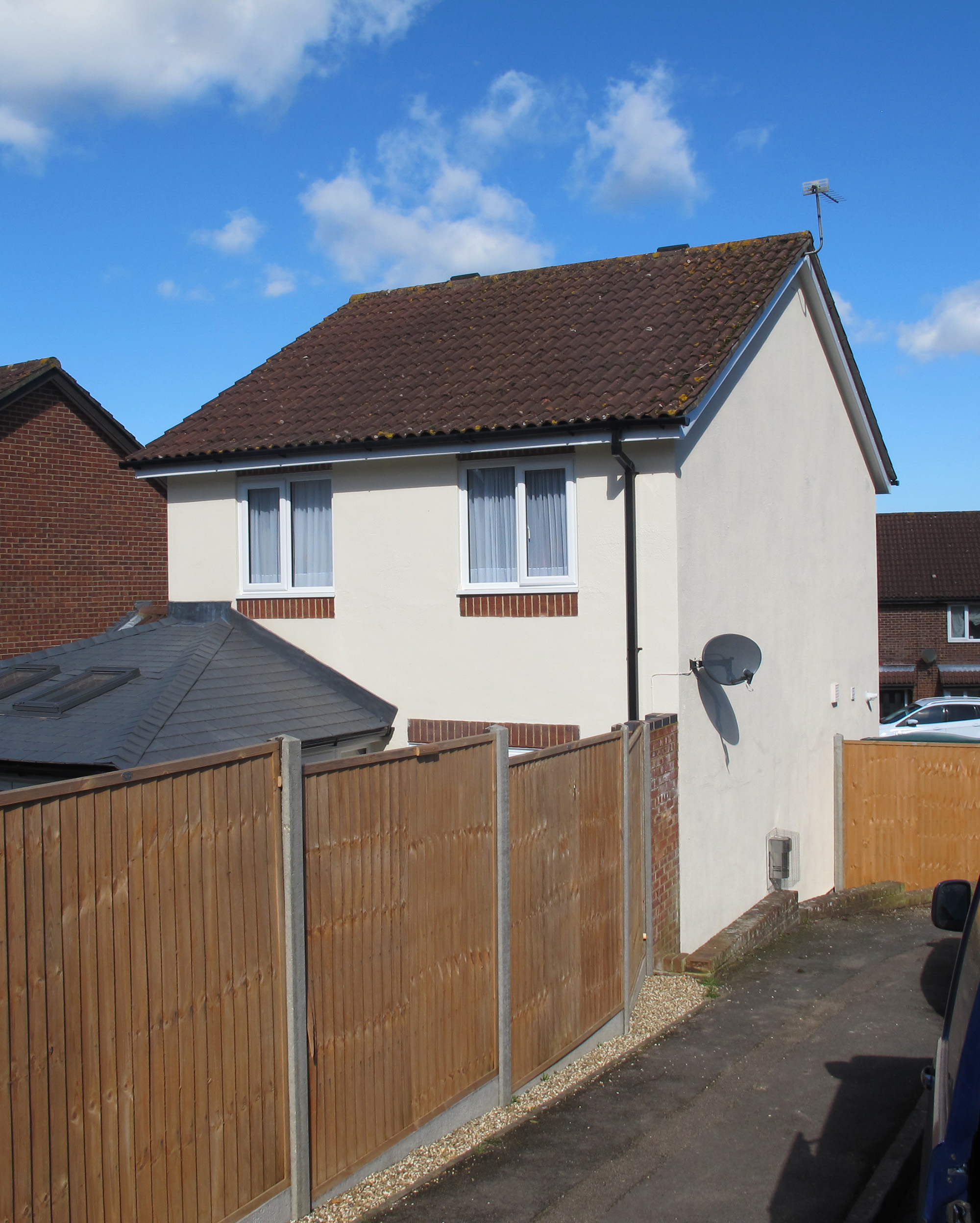 Back and side of house - after Back and side of house after Facelift