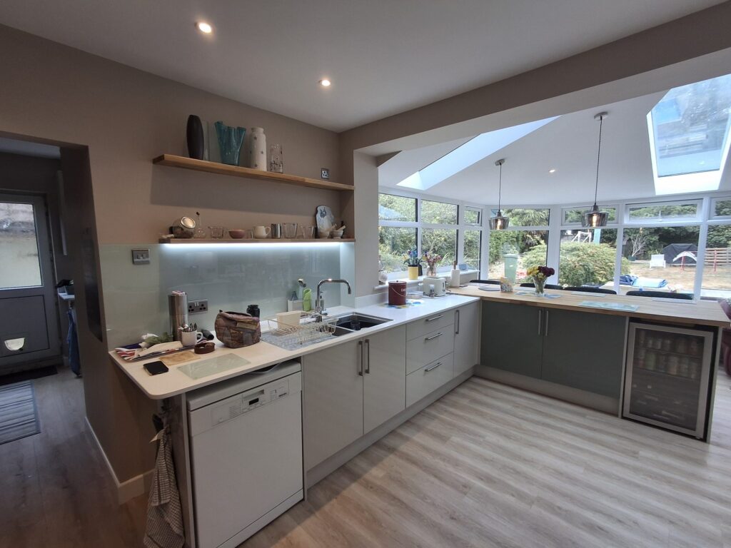 Ground floor refurbishment Crawley 8 New kitchen opening into the replacement conservatory with roof lights
