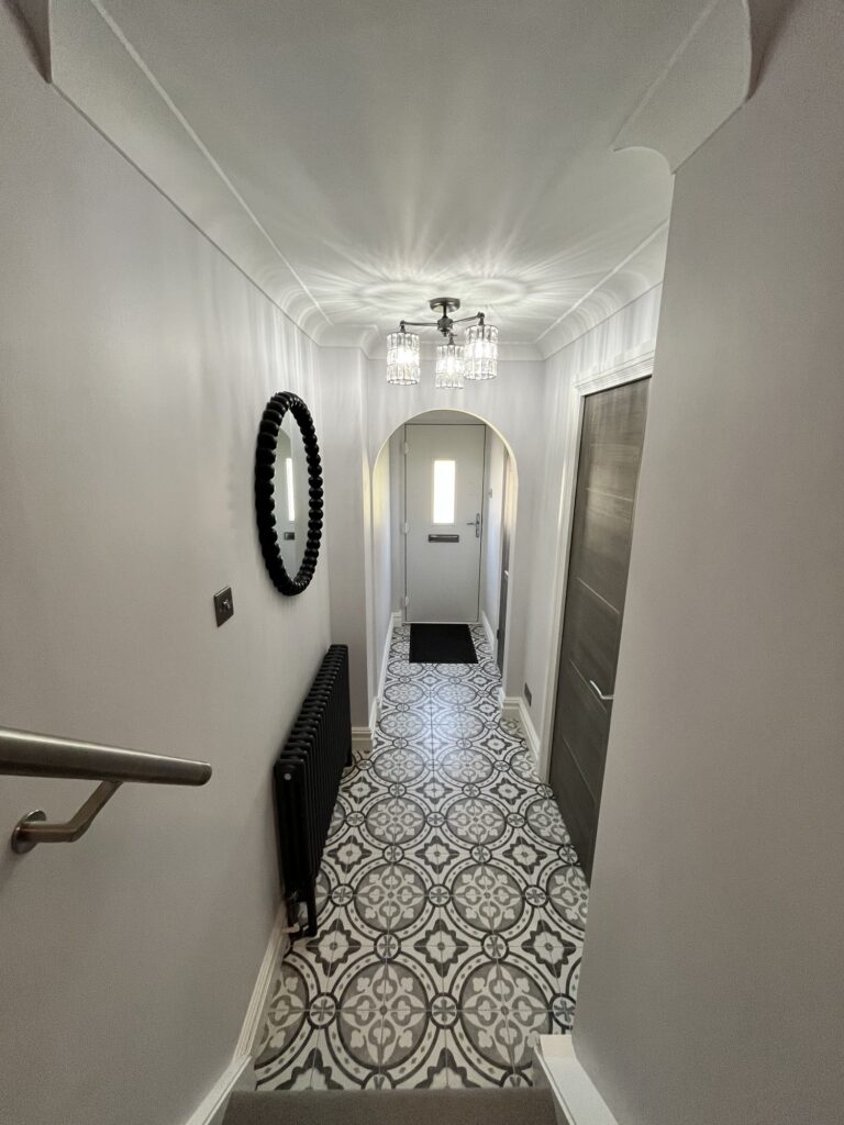 Home refurbishment Crawley 16 Hallway with patterned flooring, new skirting and grey internal doors